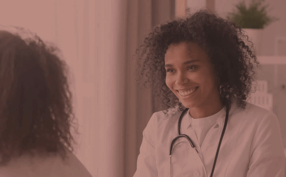 healthcare provider talking to a patient